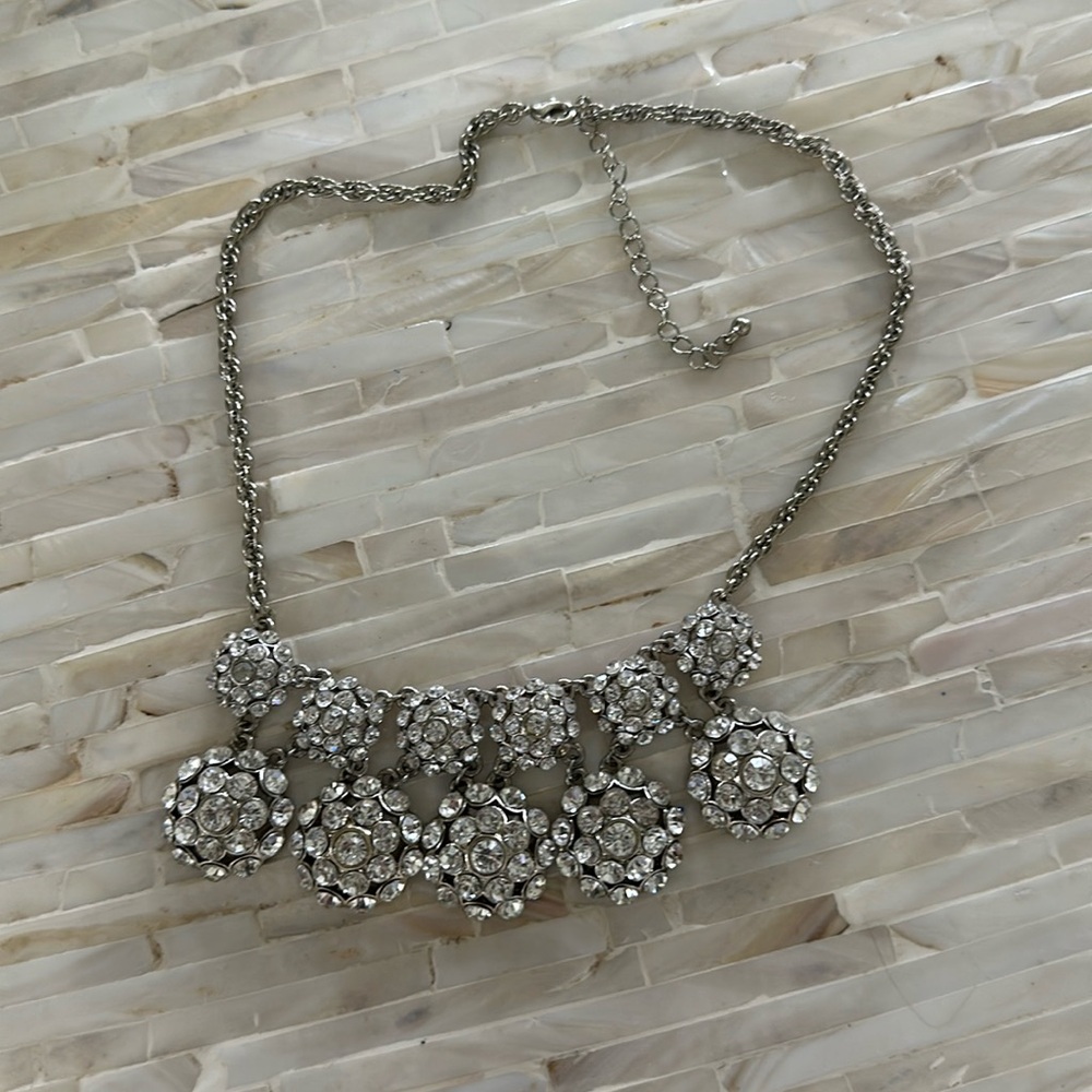Like new statement necklace. Silver chain.